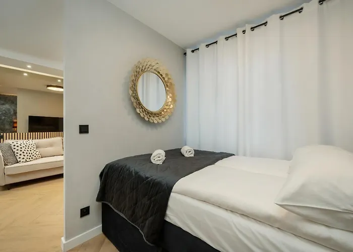 Black And Beige Apartment With Balcony And Parking In Wroclaw By Noclegi Renters